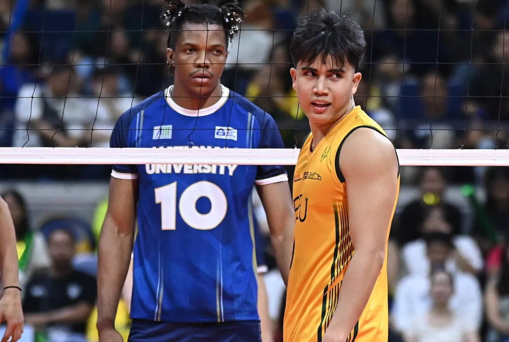 Obed Mukaba (L) of NU Bulldogs and Dryx Saavedra (R) of FEU Tamaraws